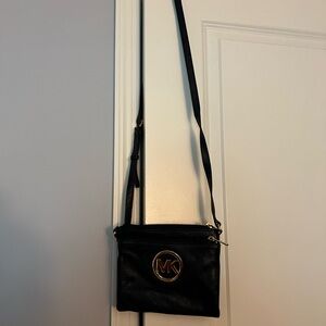 Michael Kors Dark Blue Leather small shoulder bag.